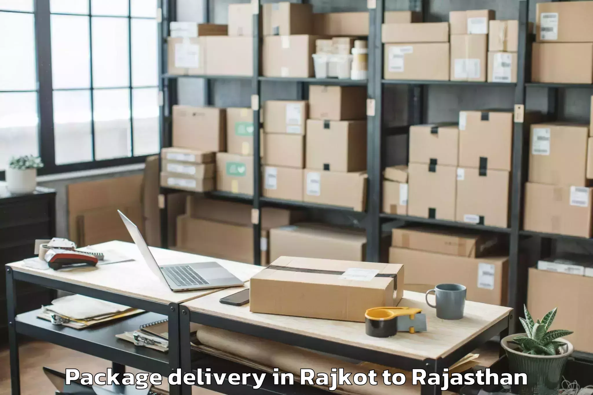 Hassle-Free Rajkot to Ghatol Package Delivery